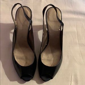 Black leather sling back shoes